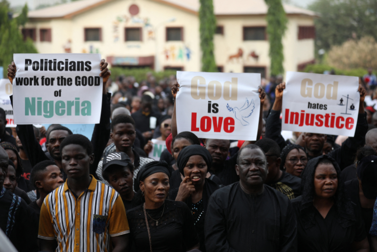 Mit Plakataufschriften wie „Gott ist Liebe“ demonstrierten Christen bereits am 1. März 2020 in Abuja für Frieden und Sicherheit in Nigeria.